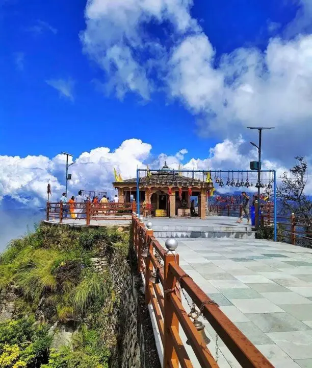Maha Gauri Hotel building and mountain surroundings